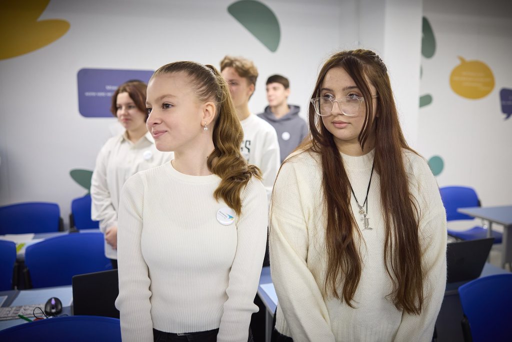 Students in a classroom studying without smartphones on their desks